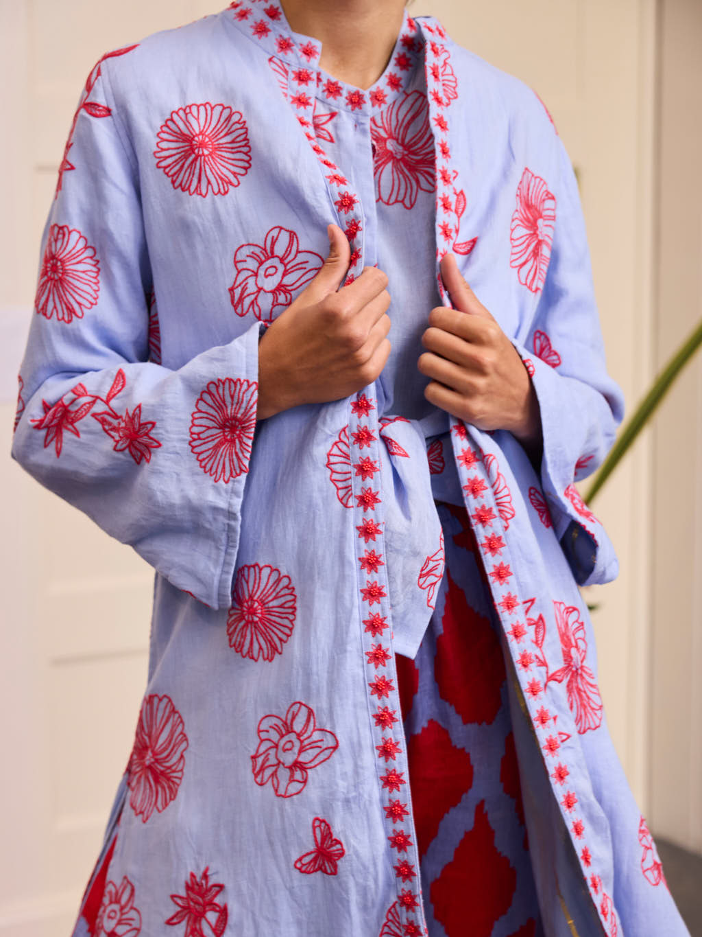 Chili Pepper Coat Red Flowers on Pastel Blue