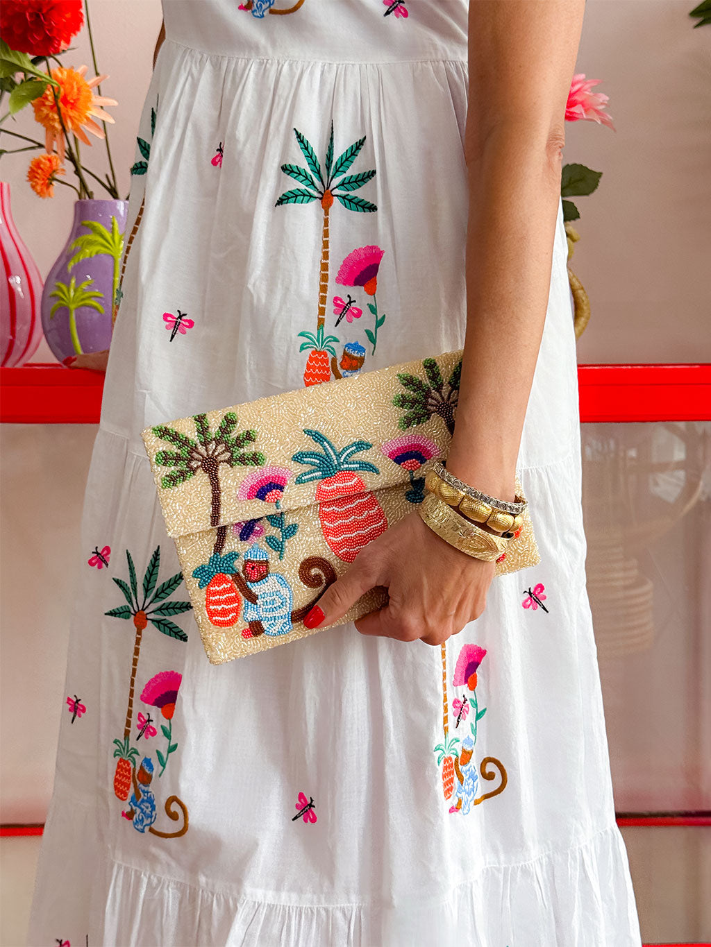 Handcrafted glass seed bead clutch bag with colourful monkey, palm tree and pineapple design by Nimo With Love