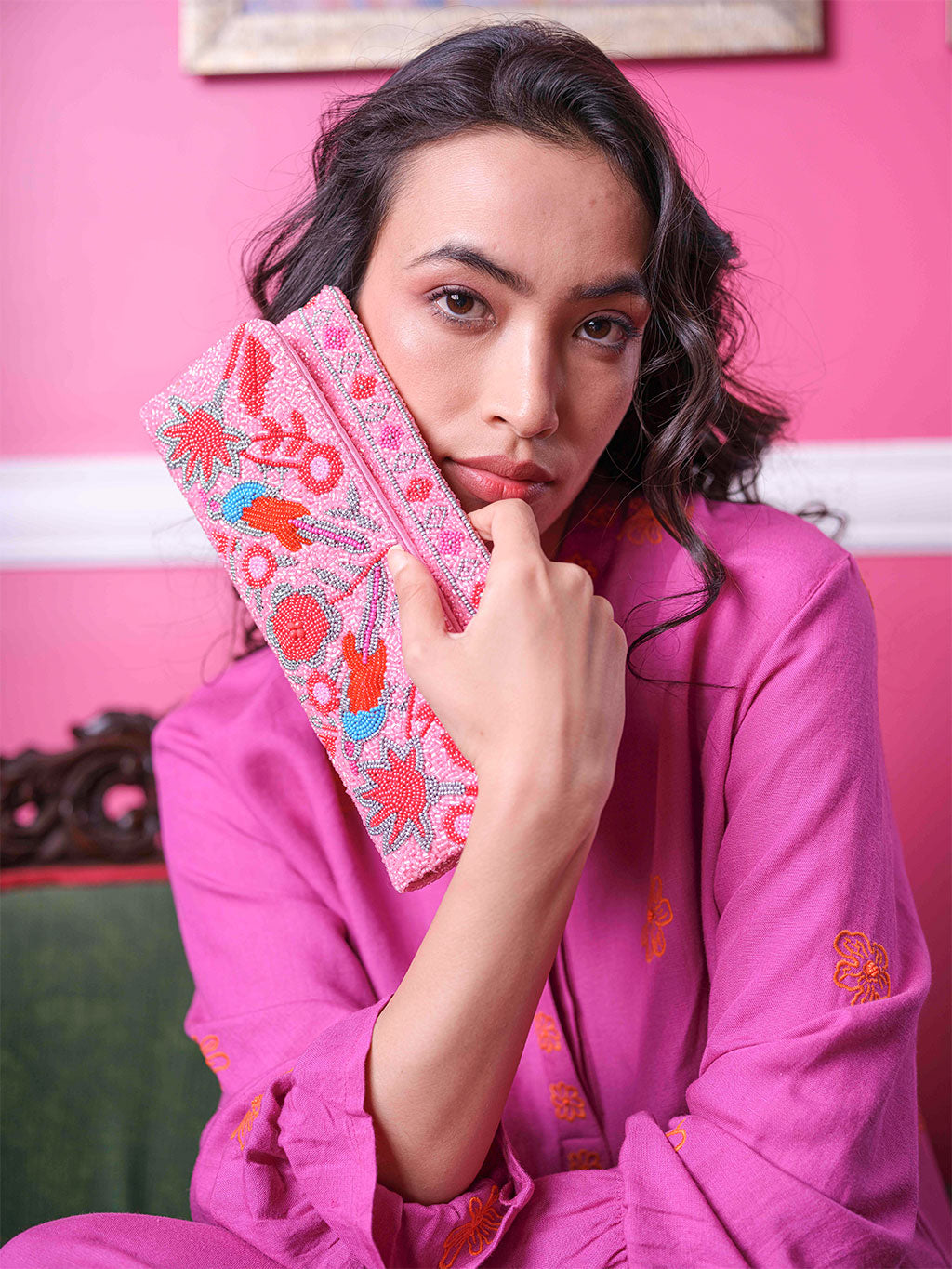 Nimo with Love pink beaded clutch with handcrafted floral and bird motif. Envelope bag silhouette, 