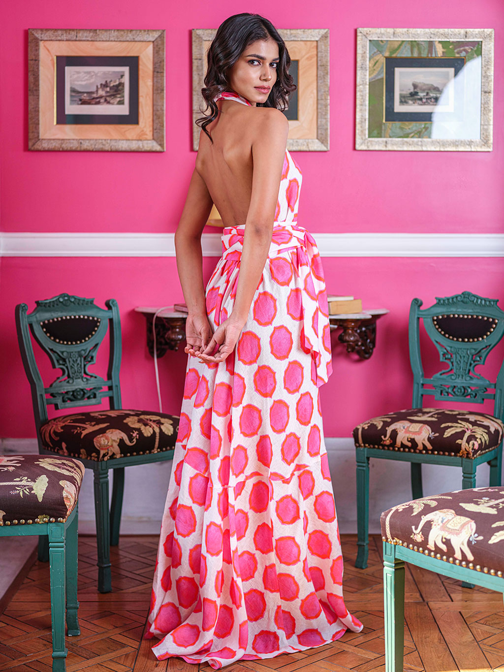 Stunning deep back view of the Hops neckholder dress in ikat pink orange