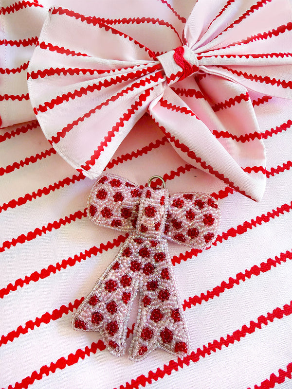Bow Ornament with Pearls Red Dots on Pale Pink
