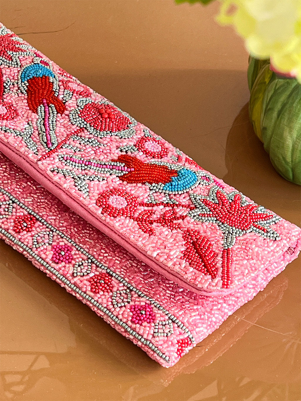 Pink beaded luxury boho clutch with floral design