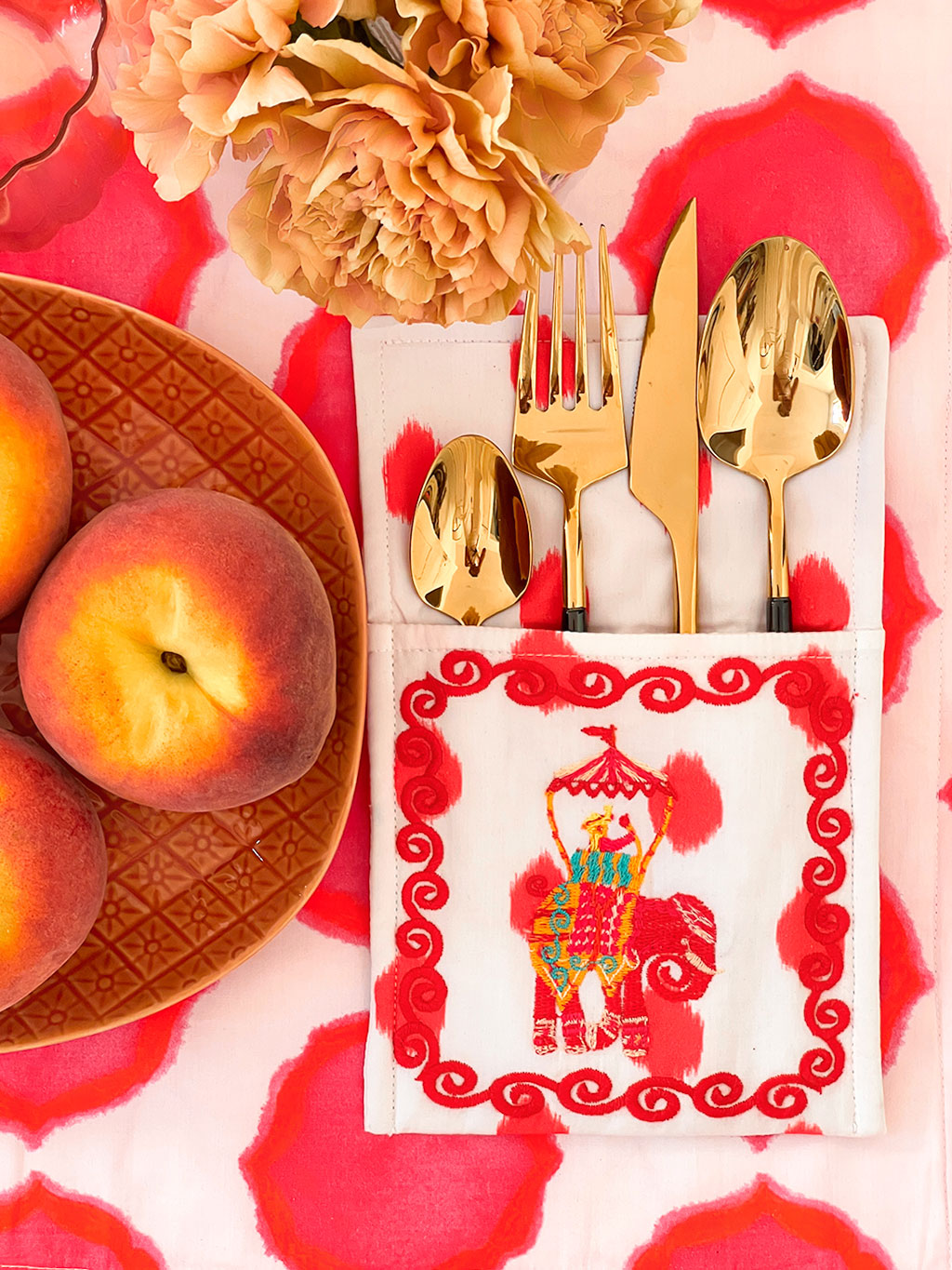 Sophisticated bohemian tablescape with Nimo With Love embroidered linens