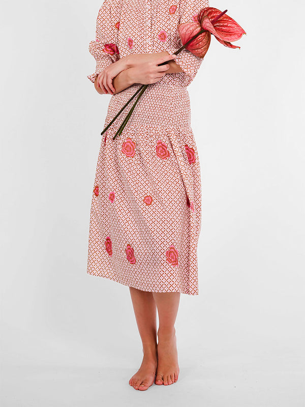 Detailed view of the wide smocked waistband on the Lads Love skirt, showcasing its flexible and flattering fit.