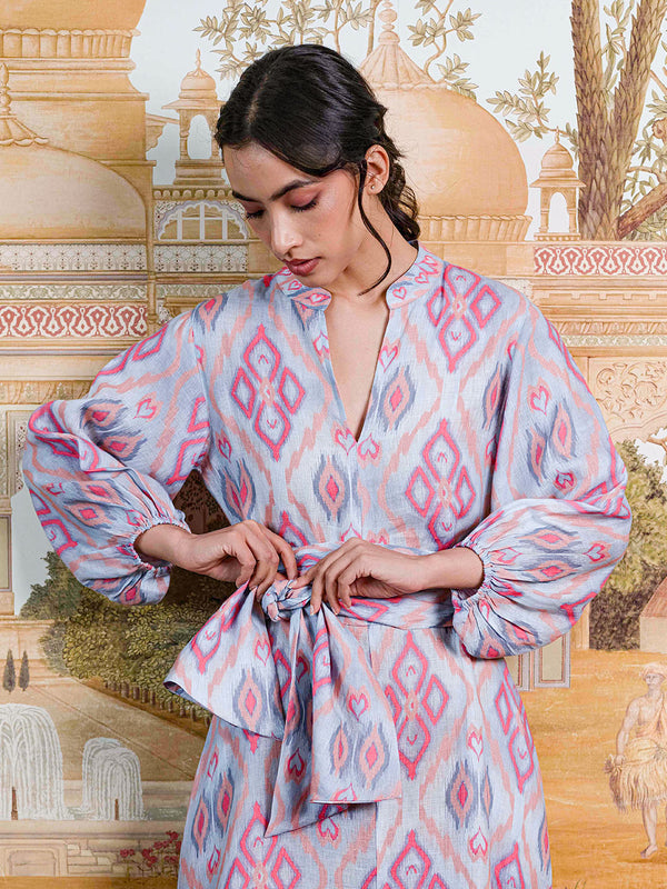 Detailed shot of the mandarin collar and V-neckline on the premium linen Marigold dress.