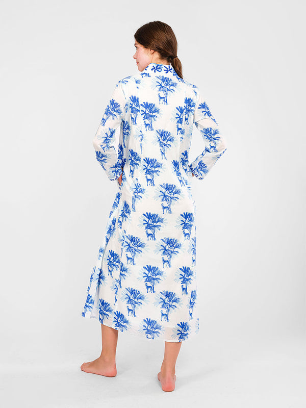 Rear view of the Sandalwood dress showcasing the clean A-line silhouette and the rhythmic placement of the blue zebra motif.