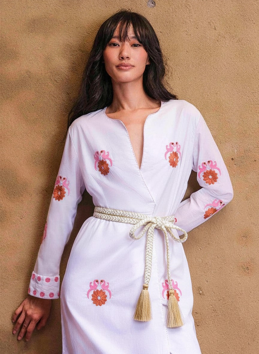 Nimo With Love signature belt as a styling detail for a white kaftan