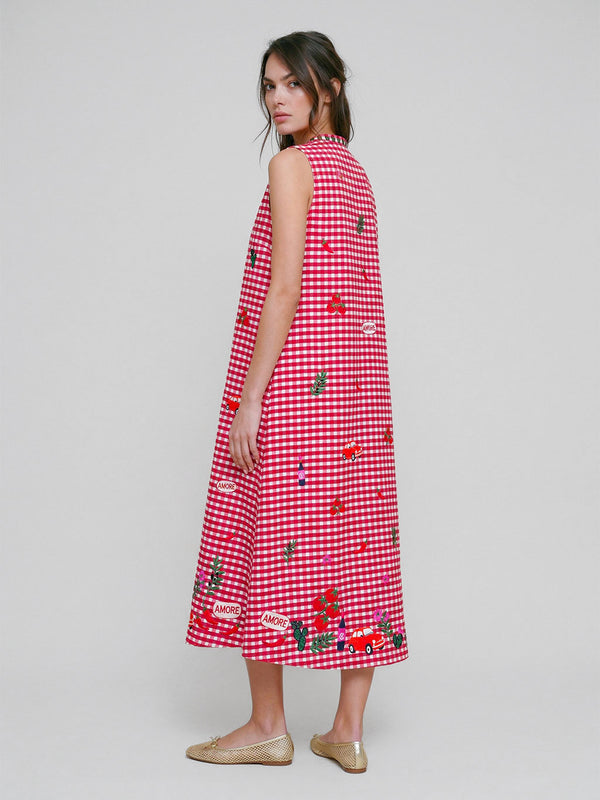 A-line sleeveless midi dress in red and white gingham, blending Nimo’s minimalist silhouette with charming Italian embroidery.