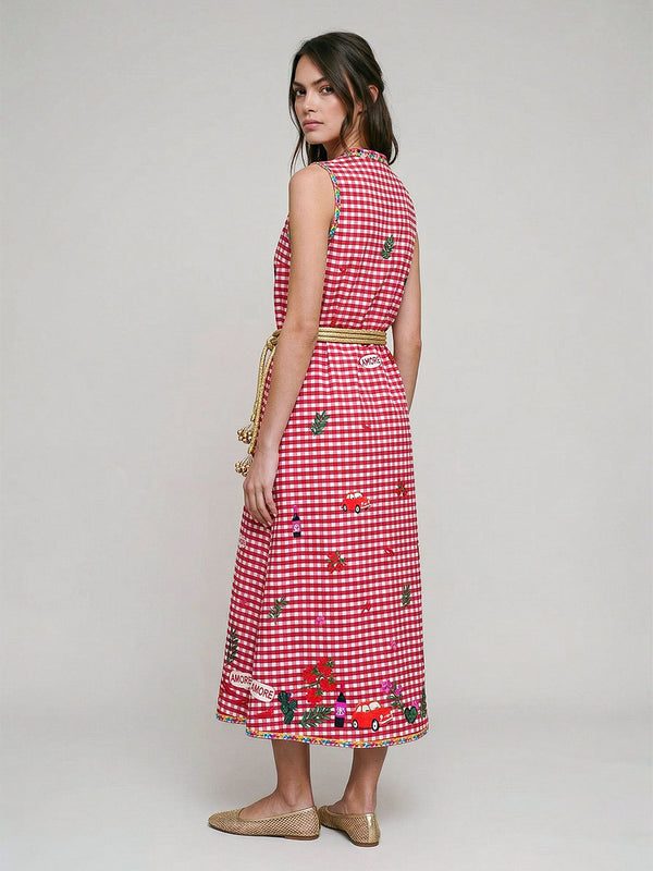 Artisanal craftsmanship meets Mediterranean charm in this limited-edition Nimo cotton dress with vibrant red embroidery.