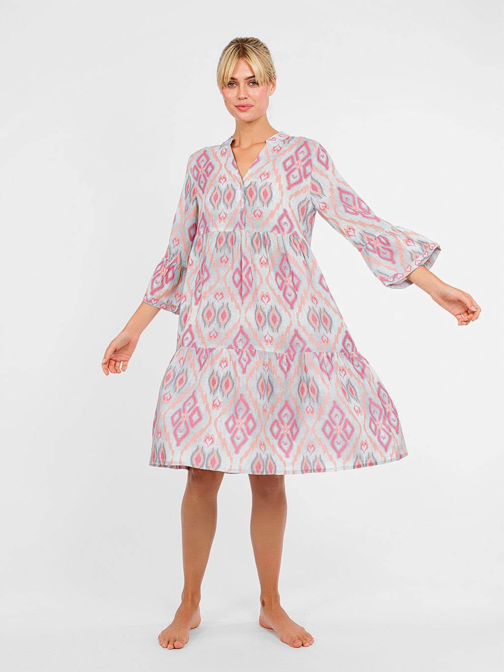 Detailed shot of the feminine flared 3/4-sleeves on the premium linen Borage dress.