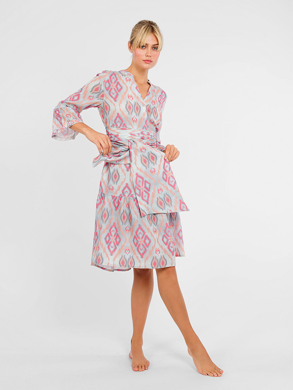 Model wearing the Borage dress cinched with the oversized Scarf Belt Ikat Sorbet for a high-fashion waist definition.