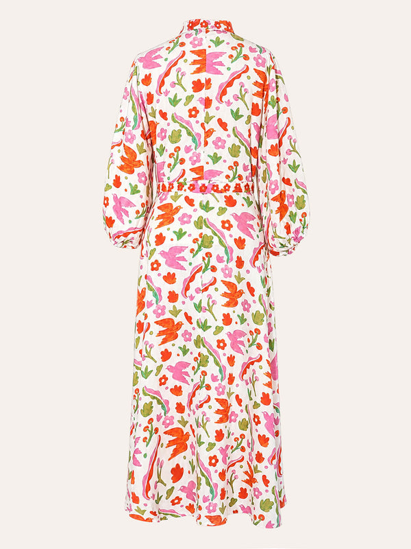 Back of Marigold linen maxi dress by Nimo With Love featuring a vibrant pink and orange botanical Mexico print.