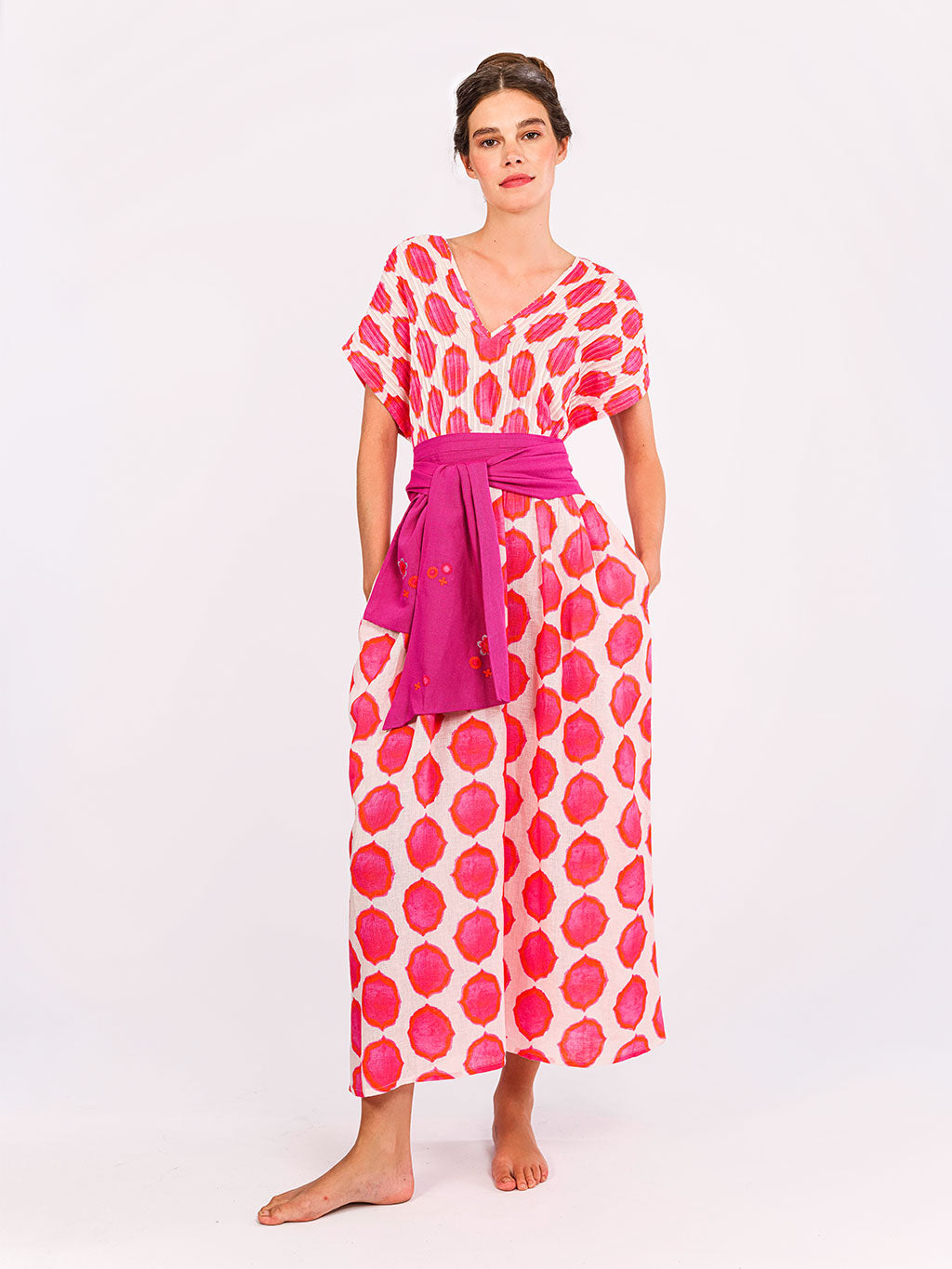 Belted Sea Cale dress showing a defined waist and voluminous linen skirt